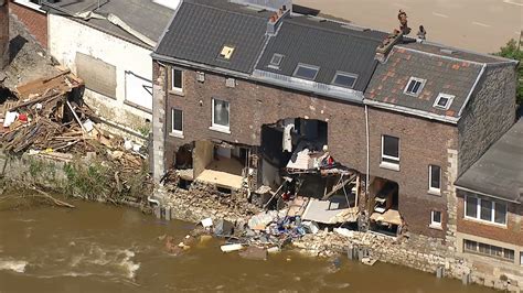 Footage Shows Damaged Homes And Debris Lined Streets Along River After Footage Shows Damaged Homes And Debris Lined Streets Along River After