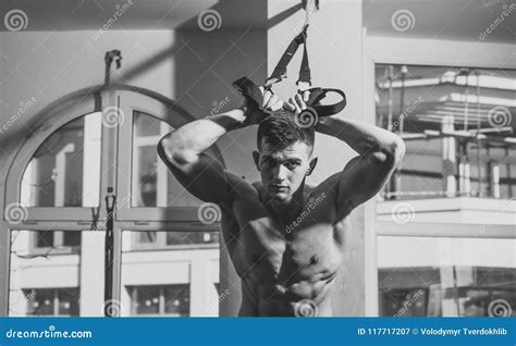 Sport And Gym Concept Man With Nude Torso And Muscular Chest In Gym Sport And Gym Concept Man With Nude Torso And Muscular Chest In Gym
